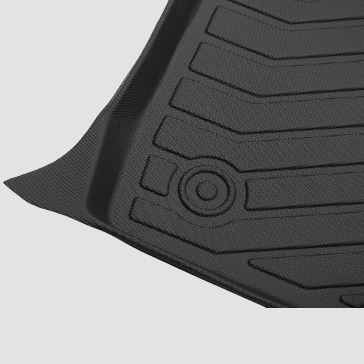 Detalj av svart 3D All Weather-matta med mönster och logotyp