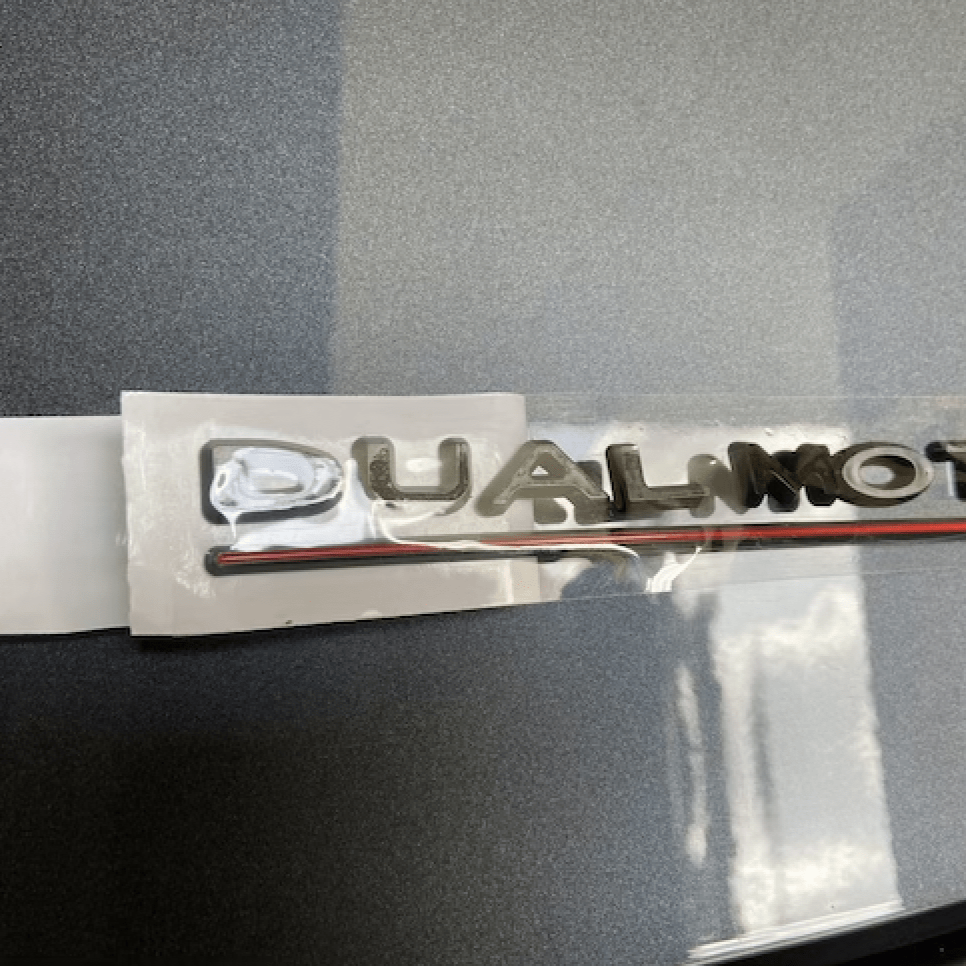 Dual Motor-emblem (flera färger)