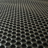 Zooma bild av bilbarnstolsskyddets textil