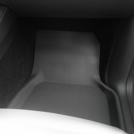 Allväders mattset för 7-sits Tesla Model Y i bilens interiör.