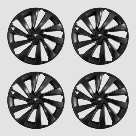Fyra svarta MV Spiral hjulkapslar med Tesla-logotyp för Model Y 2025.
