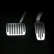 svart bild på aluminiumspedaler till Tesla