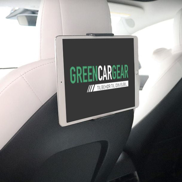 Surfplatte-/telefonhållare monterad på baksidan av en bilsits.