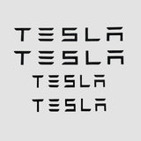 Tesla bokstäver som kan användas istället för logotypen på bilen