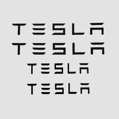 Tesla bokstäver som kan användas istället för logotypen på bilen