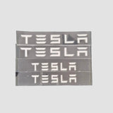 Bokstäver "TESLA"