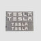 Bokstäver "TESLA"